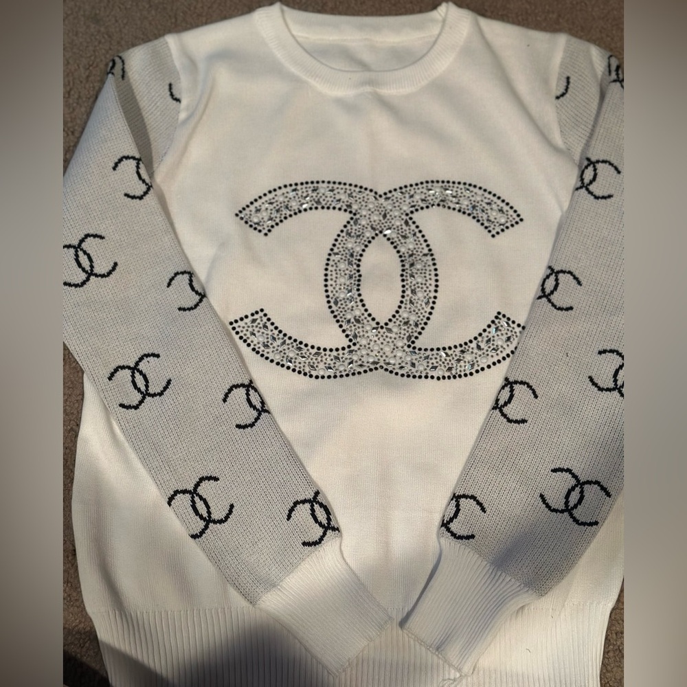 Chic White Sweater with Black Accents